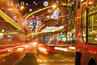 Light trails on city street at night