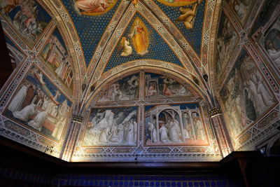 Low angle view of ornate ceiling of building