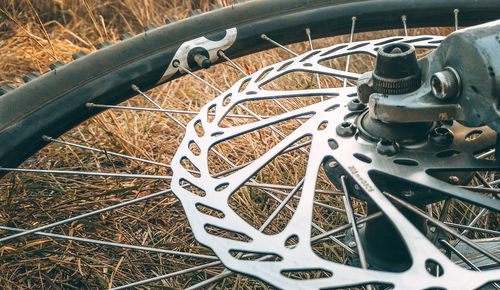 High angle view of bicycle wheel on field