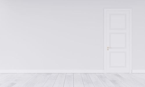 White wooden door of building