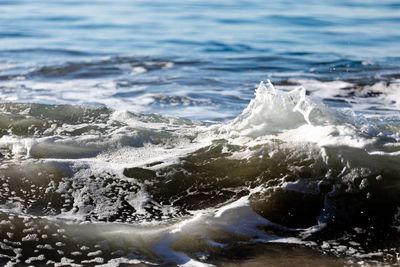 Sea waves splashing on shore