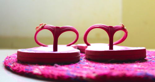 Close-up of pink flowers on table