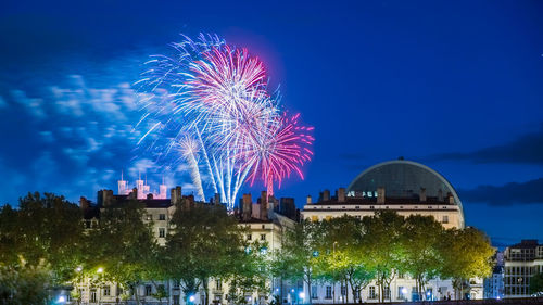 Low angle view of firework display during bastille day celebration