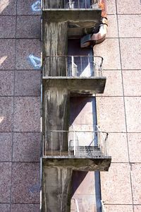 Man in front of building