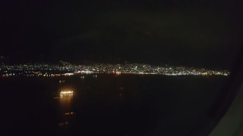 Illuminated cityscape at night