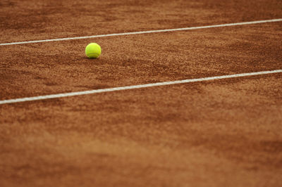 Close-up of yellow ball on field