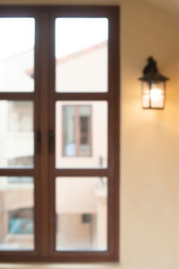 Close-up of illuminated window of house