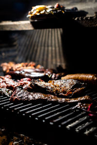 Close-up of meat on barbecue grill