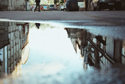 Reflection of buildings in swimming pool