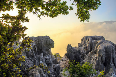 Scenic view of mountains against sky during sunset