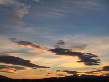 Scenic view of dramatic sky during sunset