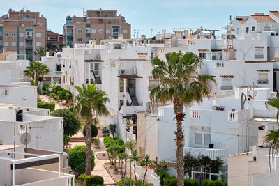 High angle view of buildings against sky