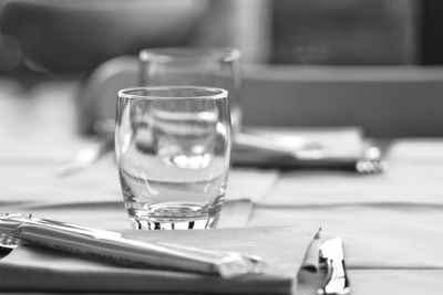 Close-up of drinking glass on table