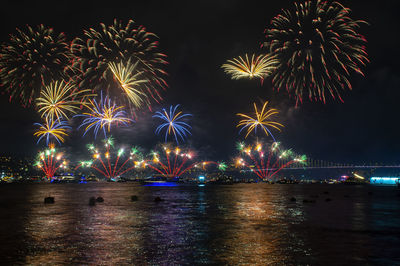 Firework display at night