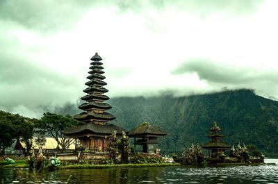 Temple against cloudy sky