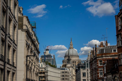 Buildings in city against sky