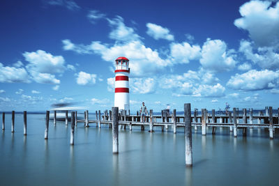 White-red lighthouse in town of podersdorf am see, freshwater neusiedler see. man of european