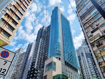 Low angle view of skyscrapers against sky