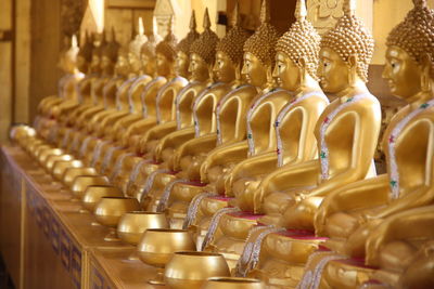 Sculpture of buddha in row
