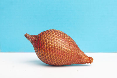 Close-up of orange fruit on table