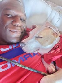 Portrait of smiling woman with dog