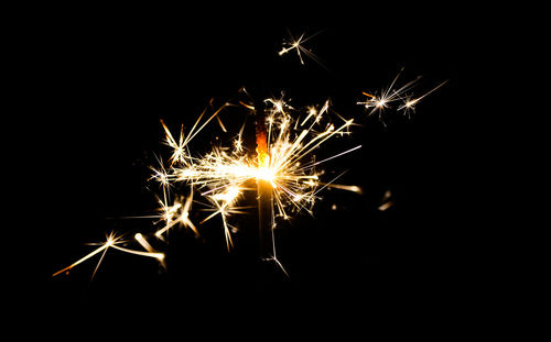 Firework display at night