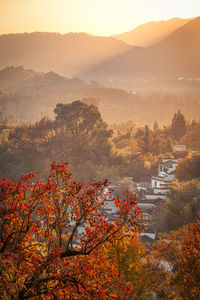 A chinese village in autumn foggy morning.