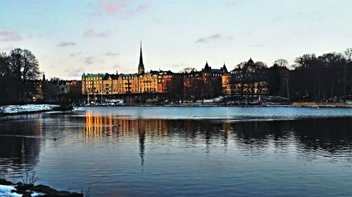 Reflection of buildings in lake