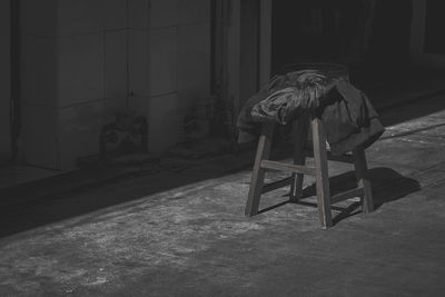 Empty chair in abandoned house