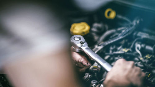 High angle view of man holding camera