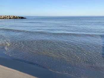 Scenic view of sea against clear sky