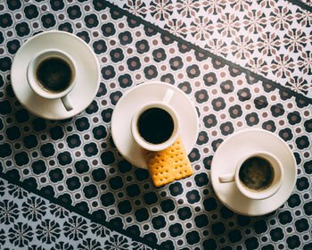 High angle view of coffee cup on table