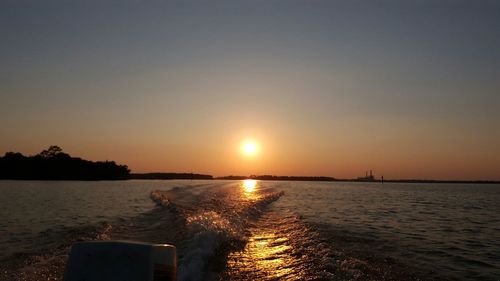 Scenic view of sunset over river