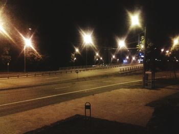 Illuminated street light at night