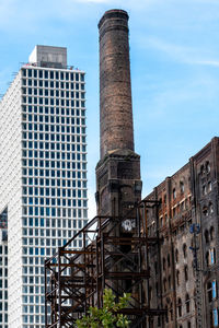 Low angle view of buildings against sky