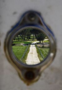 Reflection of road in puddle