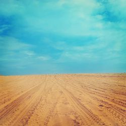 Scenic view of desert against sky