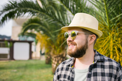 Portrait of young man wearing hat