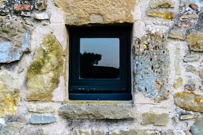 Low angle view of house window