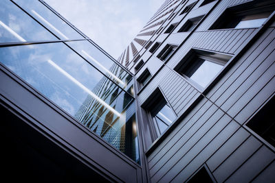 Low angle view of modern building against sky