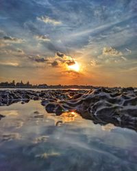 Scenic view of sea against sky during sunset