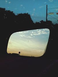 Silhouette of road at sunset