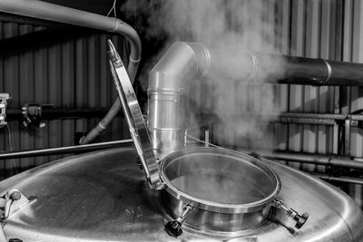 Steam emitting from storage tank in brewery