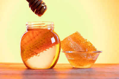 Close-up of drink in glass jar on table