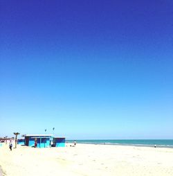 Scenic view of beach against clear sky