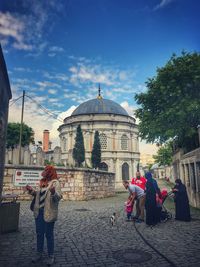 People in front of temple