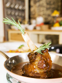 Close-up of served in bowl on table