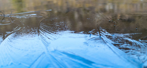 Close-up of water splashing in lake