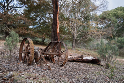 Old abandoned machinery on field