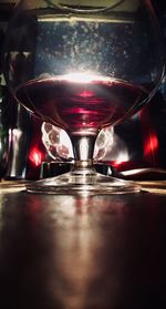 Close-up of wineglass on table